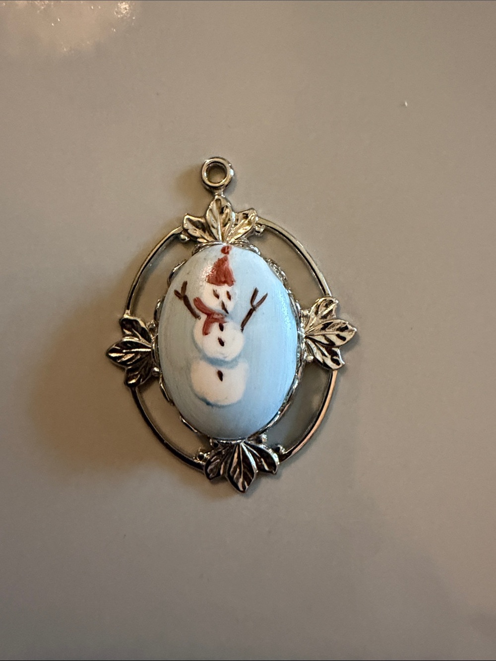 Source Unknown Light Blue and Silver Snowman Oval Pendant Necklace
